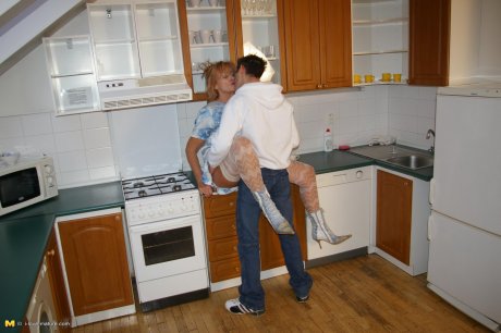 Kinky housewife fucked in her kitchen
